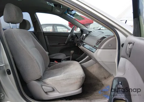 2002 Toyota Camry Le z USA, uszkodzony, nr VIN JTDBE32K220136417